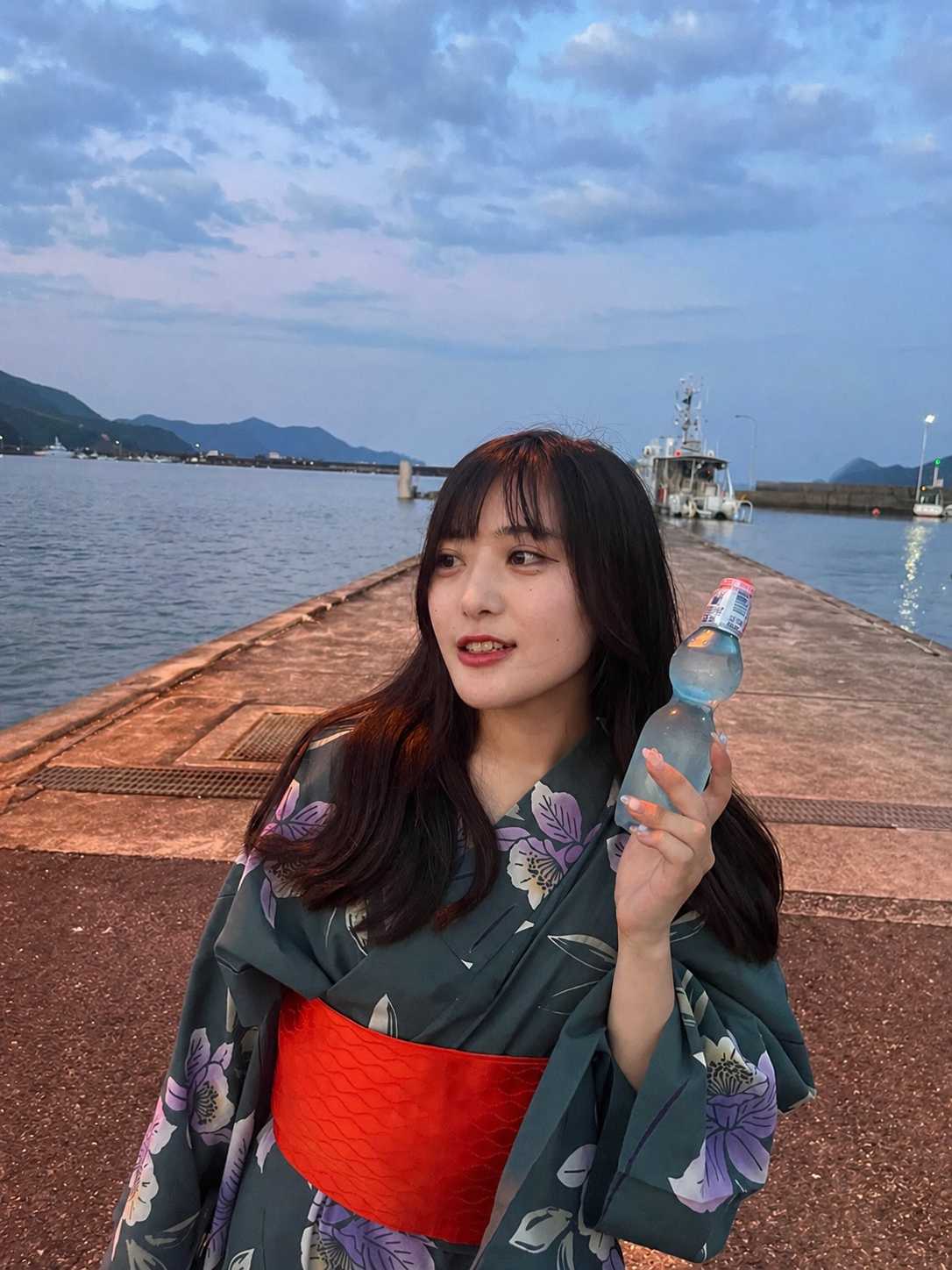 Portrait photo in a yukata by the sea